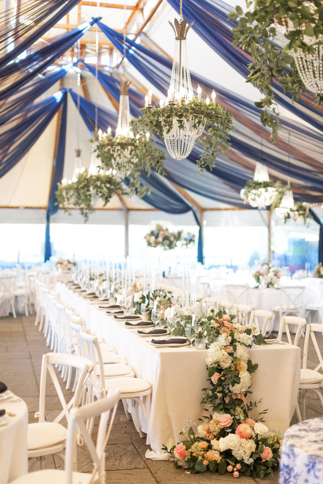 Kate-Murtaugh-Events-Castle-Hill-Inn-wedding-tent-floral-garland-drapery