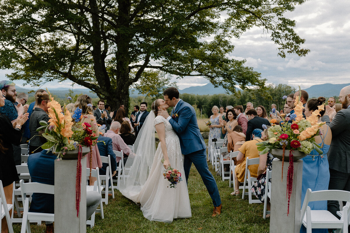bride and groom kissing at wedding
