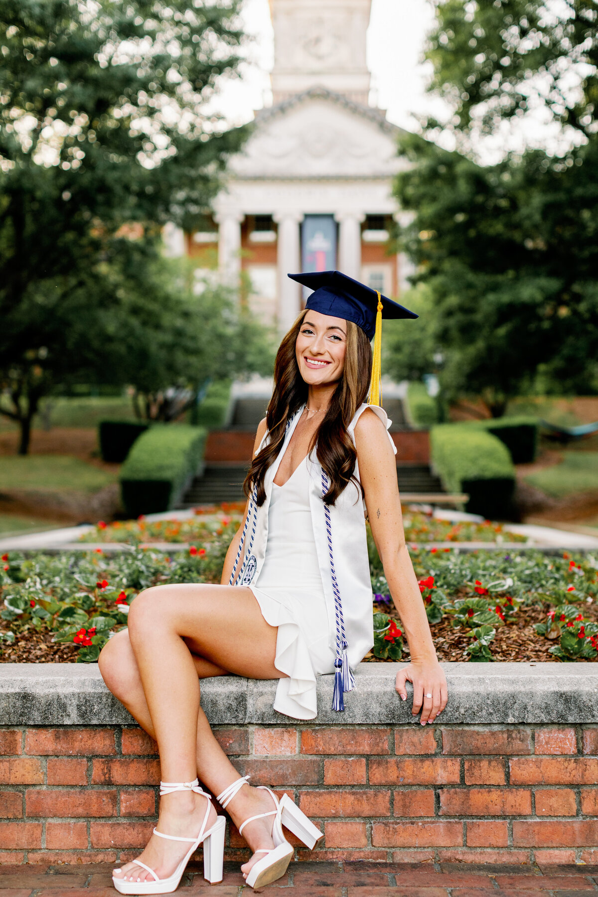 Samford University Grad Photographer captures cap and gown photos on Centennial walk