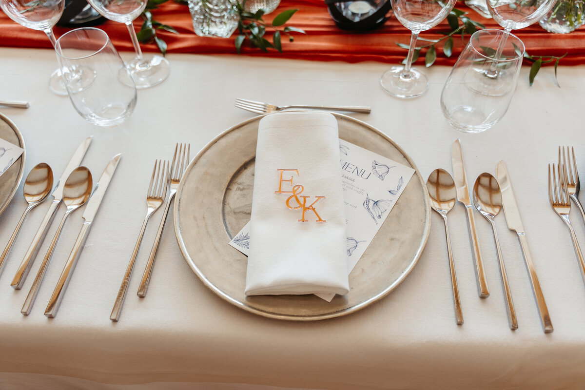 Elegant dinner table setup with red and gold accents Dolomites wedding