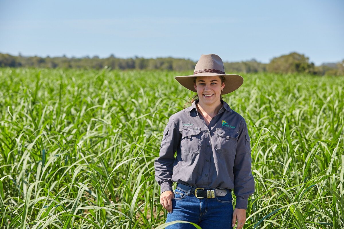 commercial photo of MSF Sugar staff member in a cane field in Marlborough