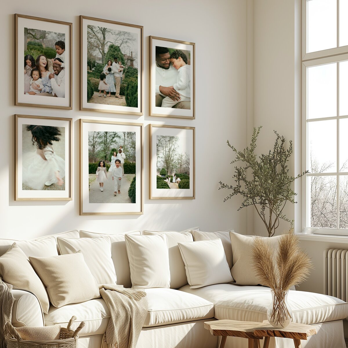gallery wall of matted prints hanging in living room over couch by huntsville photographer
