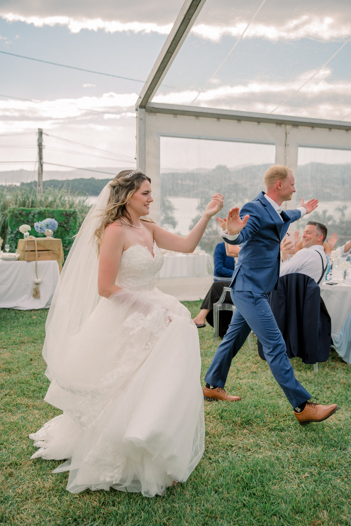 Bride and Groom enter their wedding reception in Spain