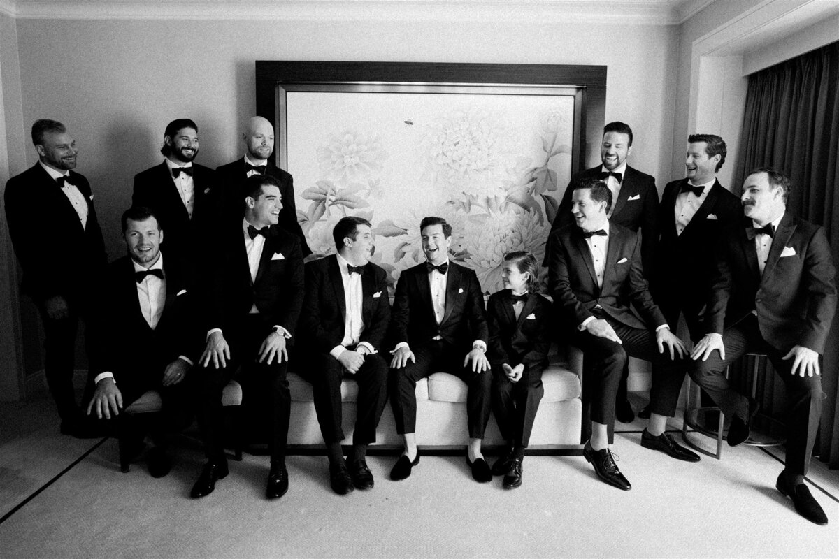 A black and white photo of the groom with his groomsmen. 
