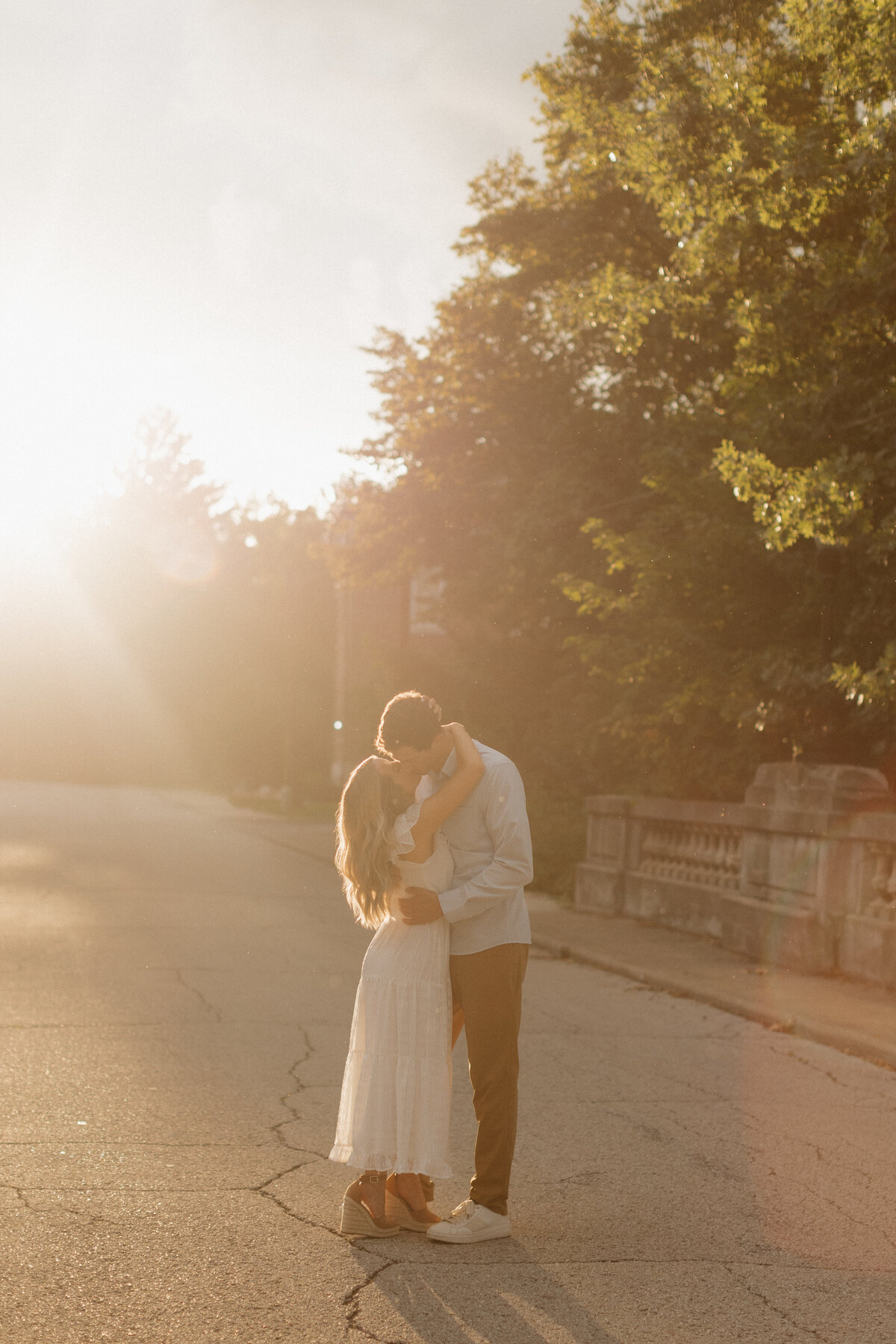 Romantic Indianapolis engagement photographer candid kiss