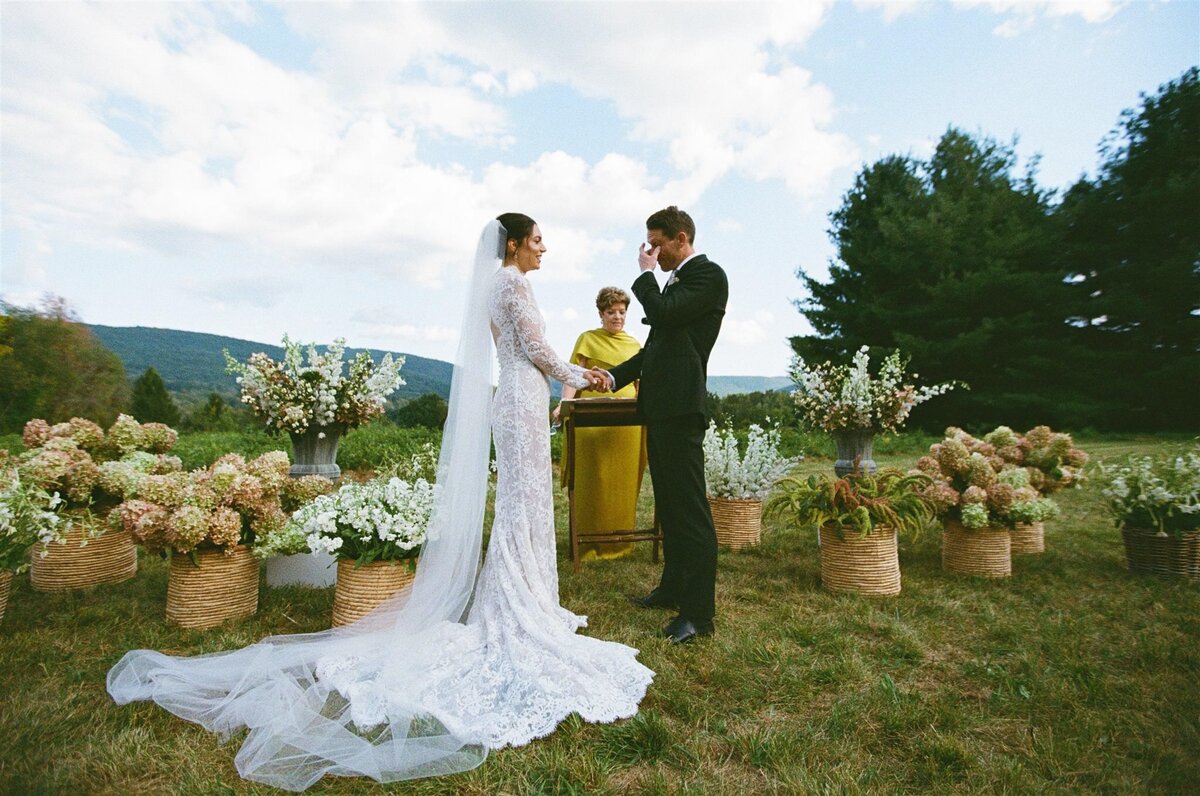 groom-wipes-tears-during-vows