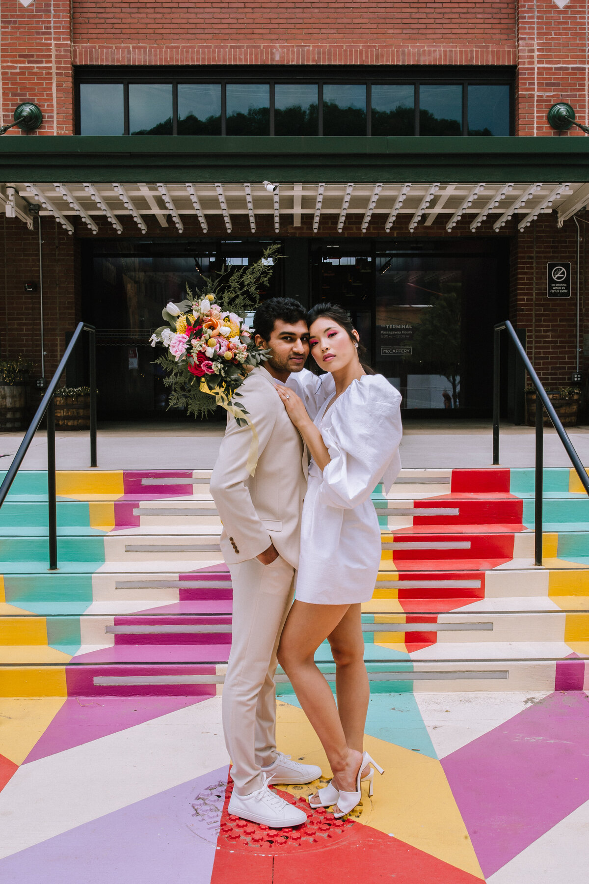 Couple eloping in the Pittsburgh strip district.