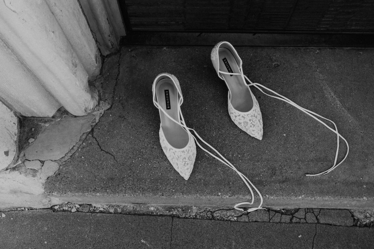 CATHOLIC CHURCH BRIDAL SHOES IN DOORWAY