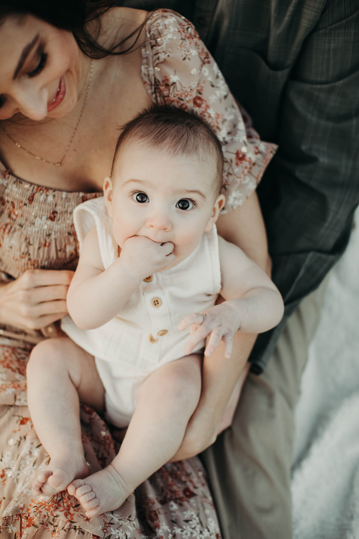 Close up of baby smiling at camera. 
