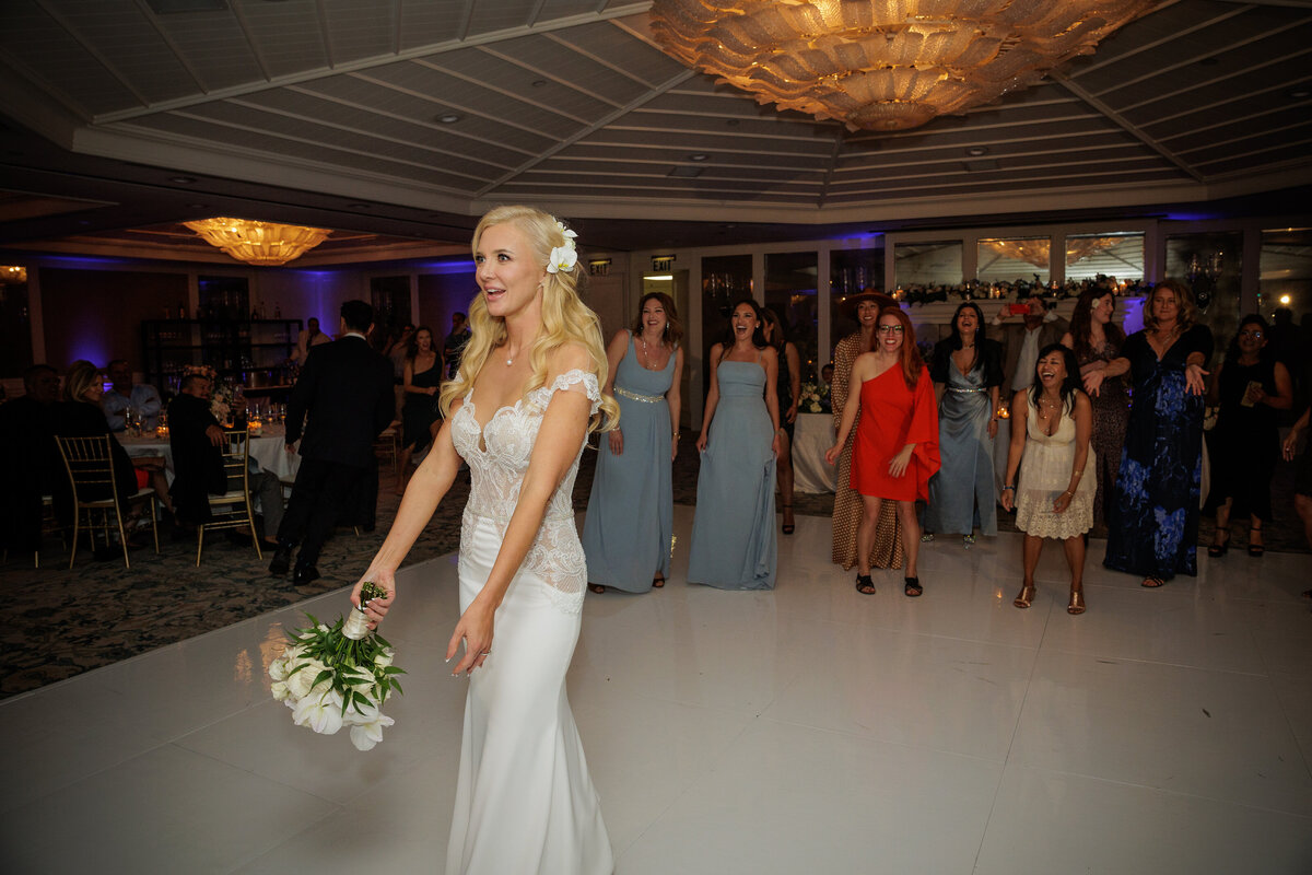 A bride about to throw her bouquet