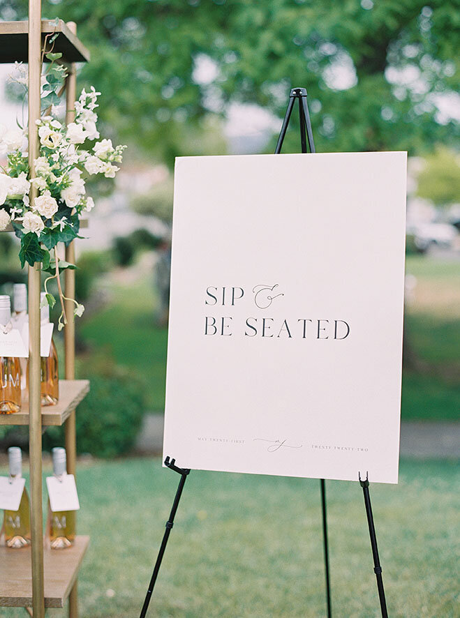 sip-and-be-seated-wedding-sign
