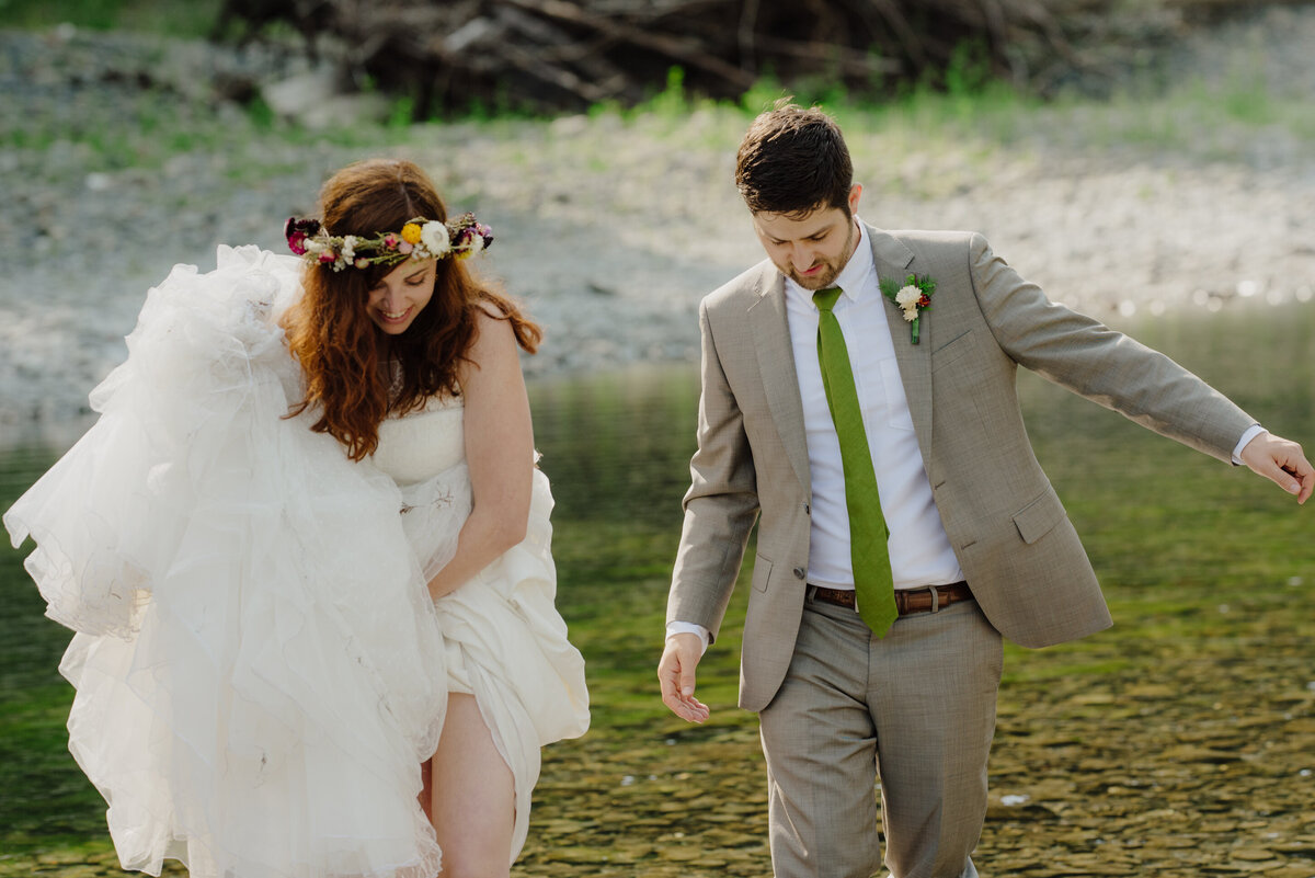 Bride and groom walk along the Van Duzen River in Humboldt County