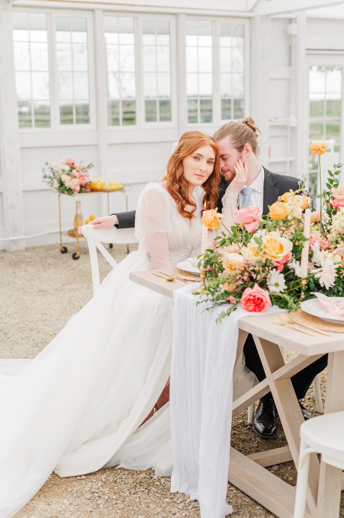 bride and groom share a moment in a tulip field the farmhouse at greenbluff in spokane washington