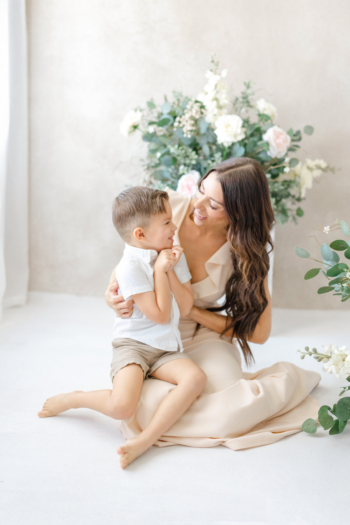Joyful Tampa motherhood portrait of mom son sharing a special moment together in studio for portraits
