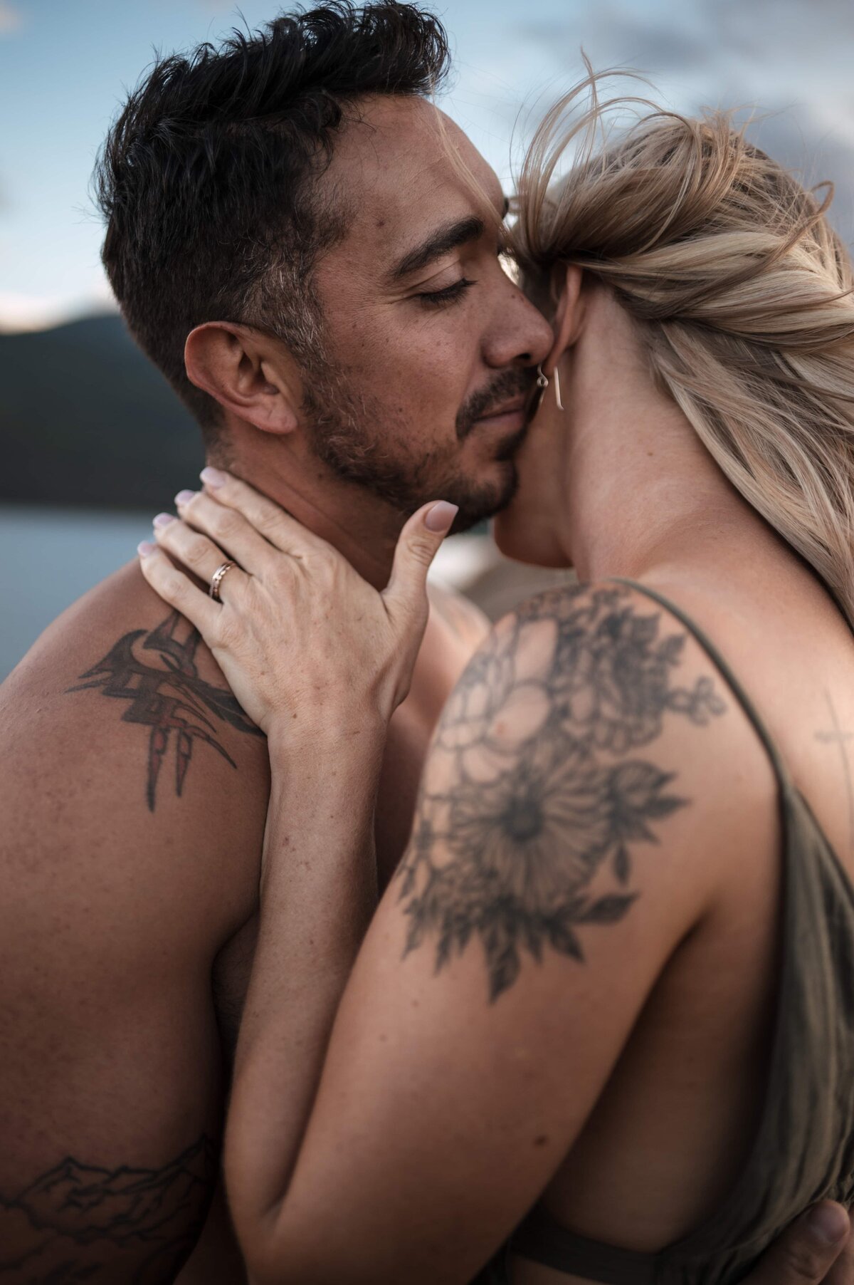Intimate lakeside portrait edited with First Light preset – soft contrast, warm skin tones, and golden-hour depth for emotional storytelling.