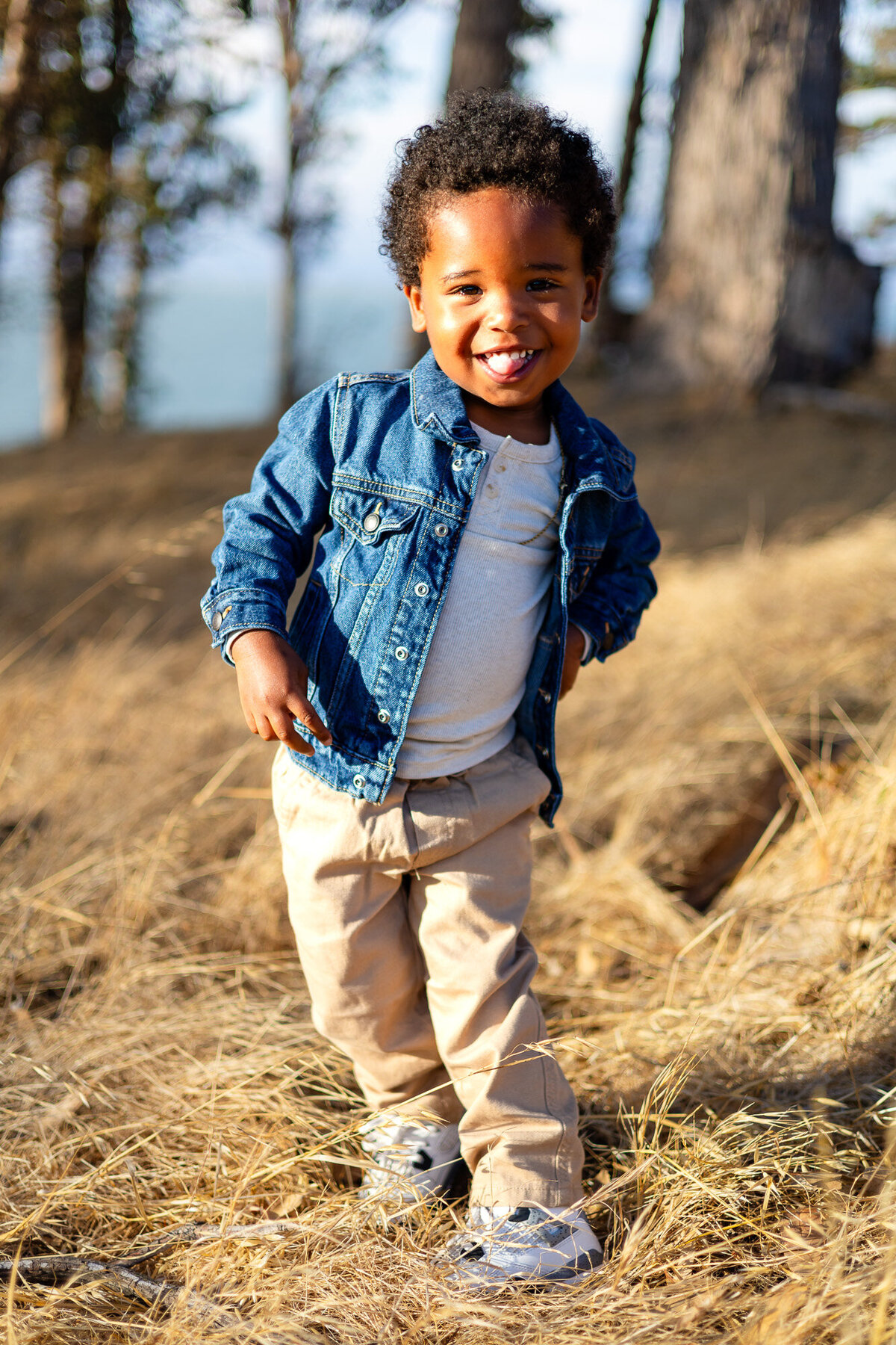 Young boy smiling in denim jacket during Bay Area Family Portfolio session – Ellobelle Photography