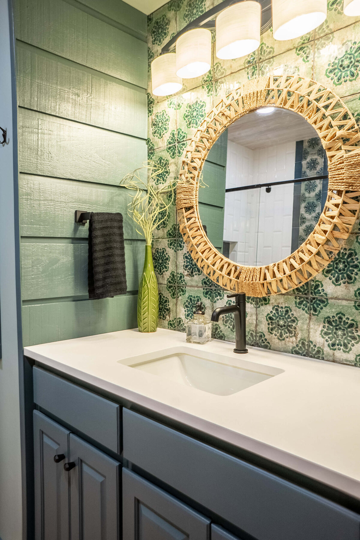 Green and blue cabin bathroom in the mountains
