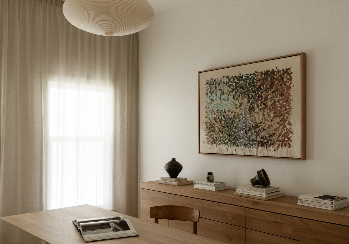 home-office-austin-design-tyler-guinn-painting-oak-cabinet-desk-noguchi-drapery-natural-light-austin-house-franc