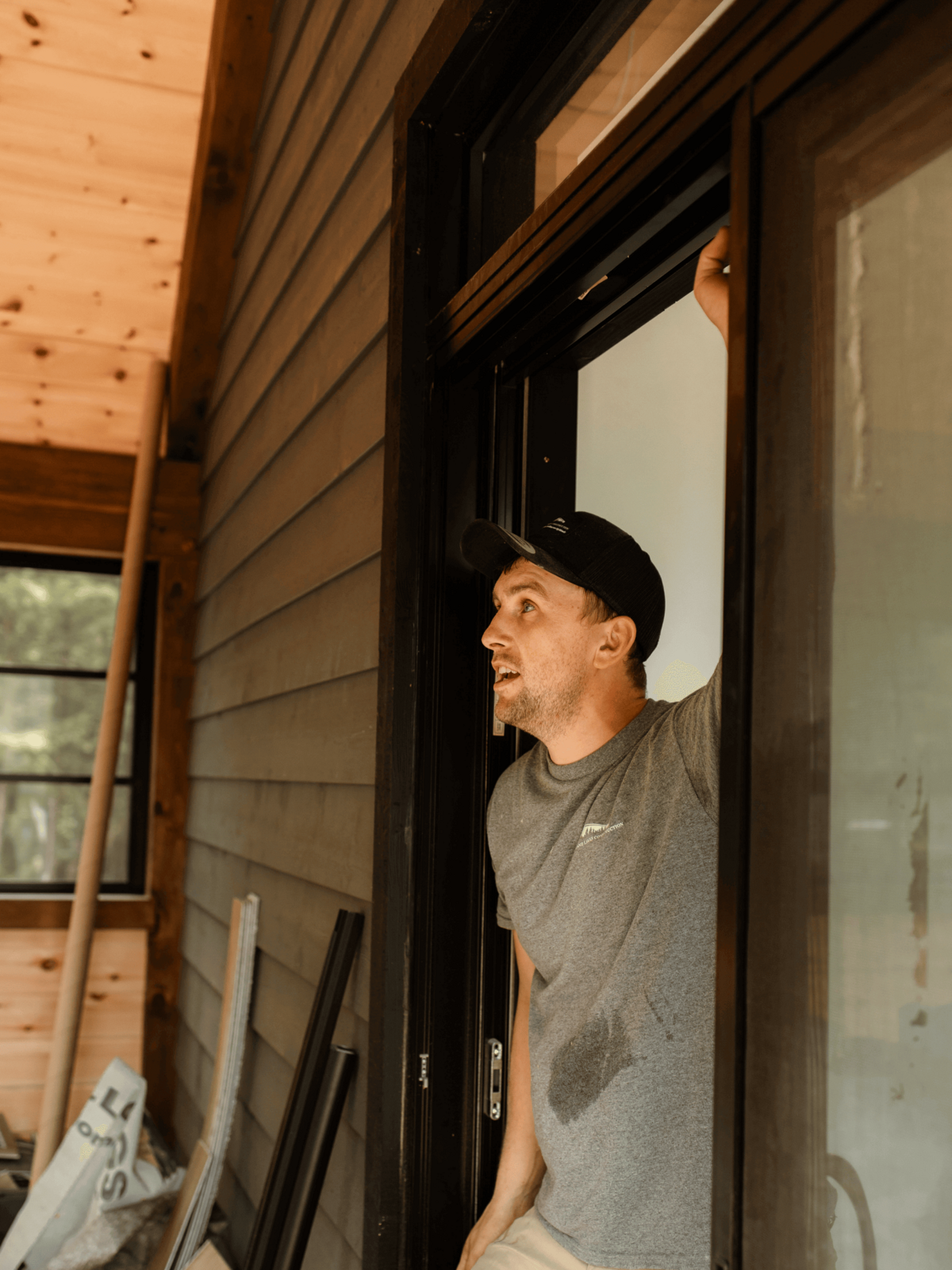 Handcrafted custom home in Haliburton Highlands with detailed woodwork and high-end finishes by skilled local builders.