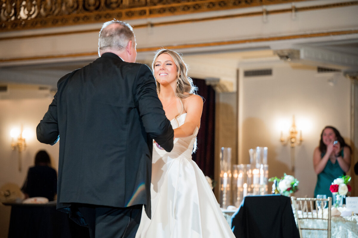 bride dancing with her dad at wedding reception