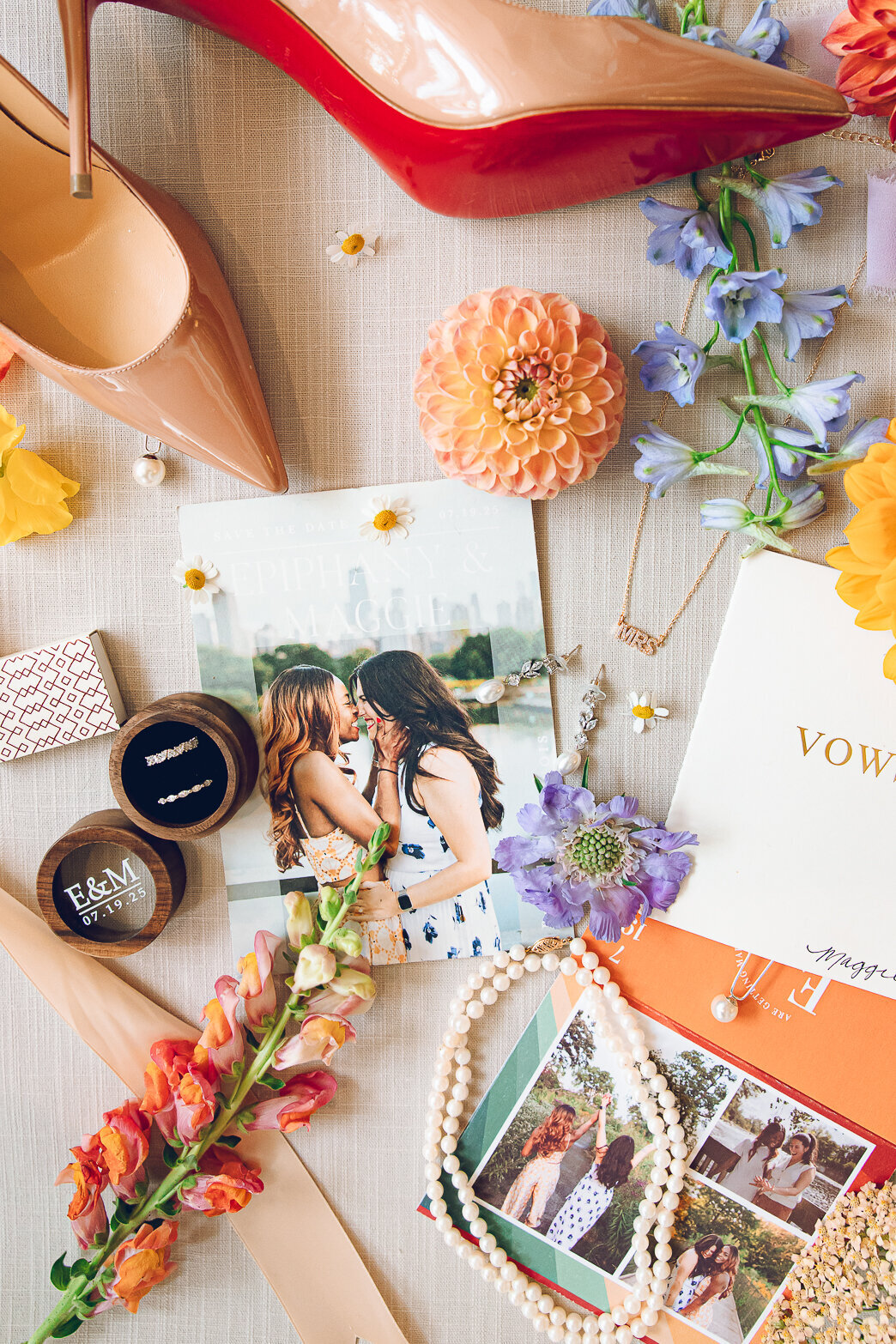 A flat lay and details from a queer couple's wedding at Room 1520 in Chicago