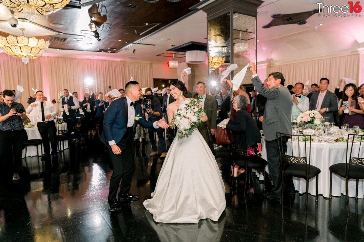 Bride and Groom enter the dance floor