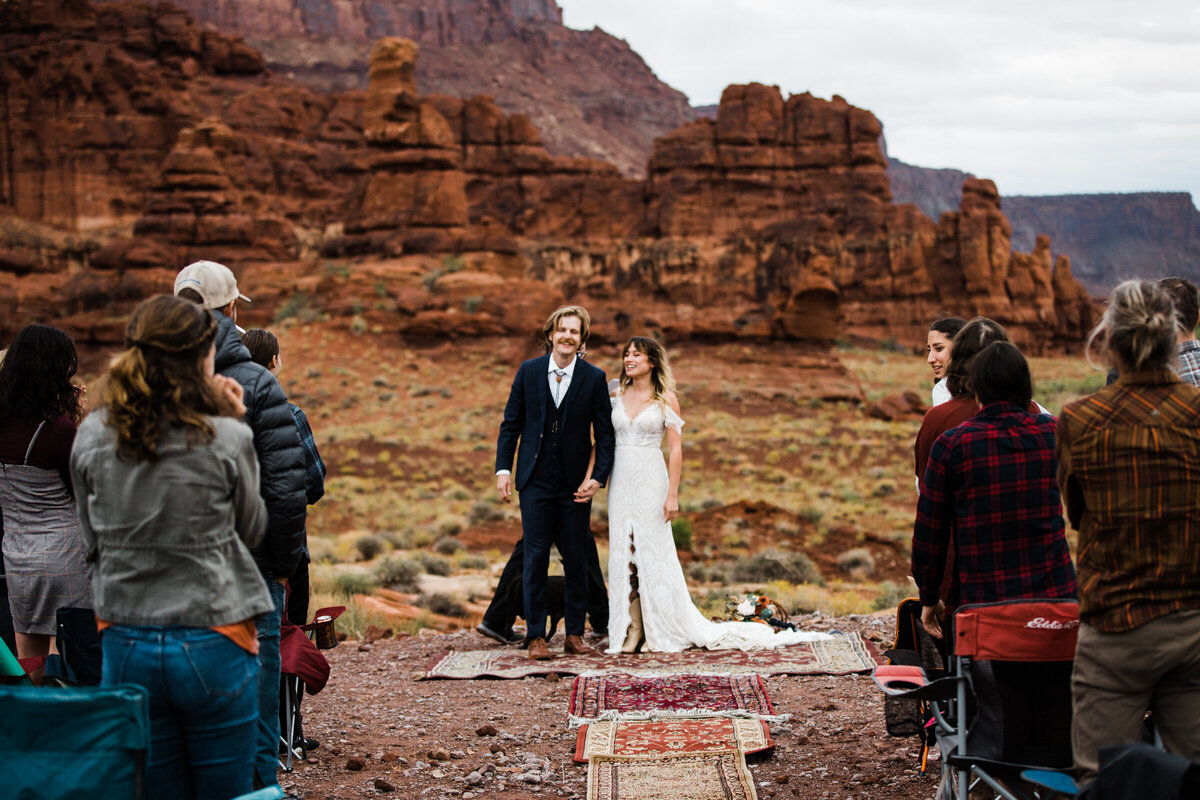 rad couple spins in the middle of a slot canyon