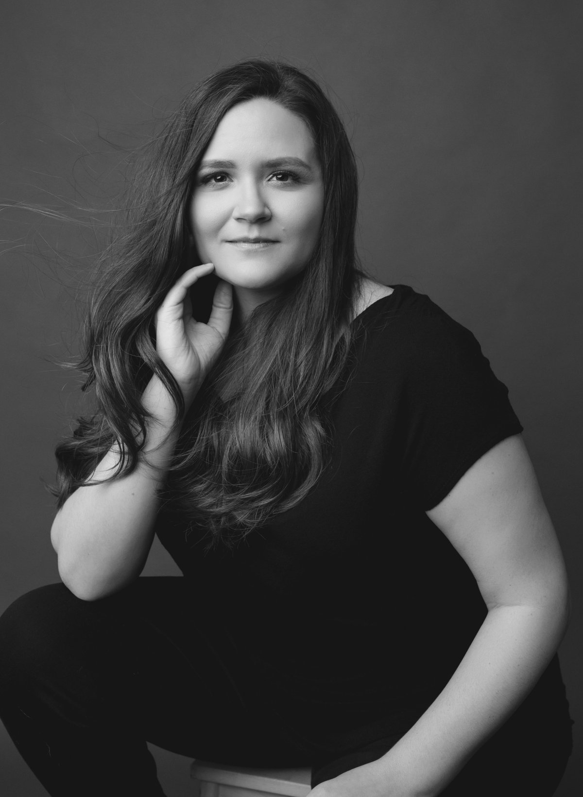 Black and white portrait of a woman looking camera center. Houston, TX.