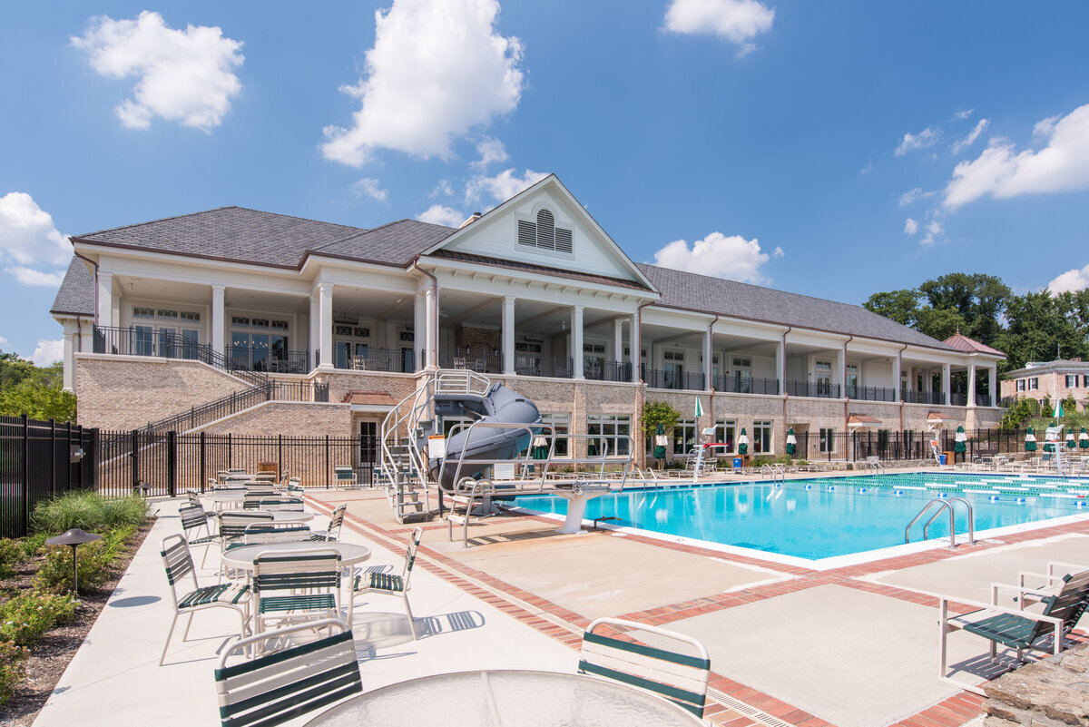 view looking over the swimming pool towards the clubhouse at Woodmont Country Club