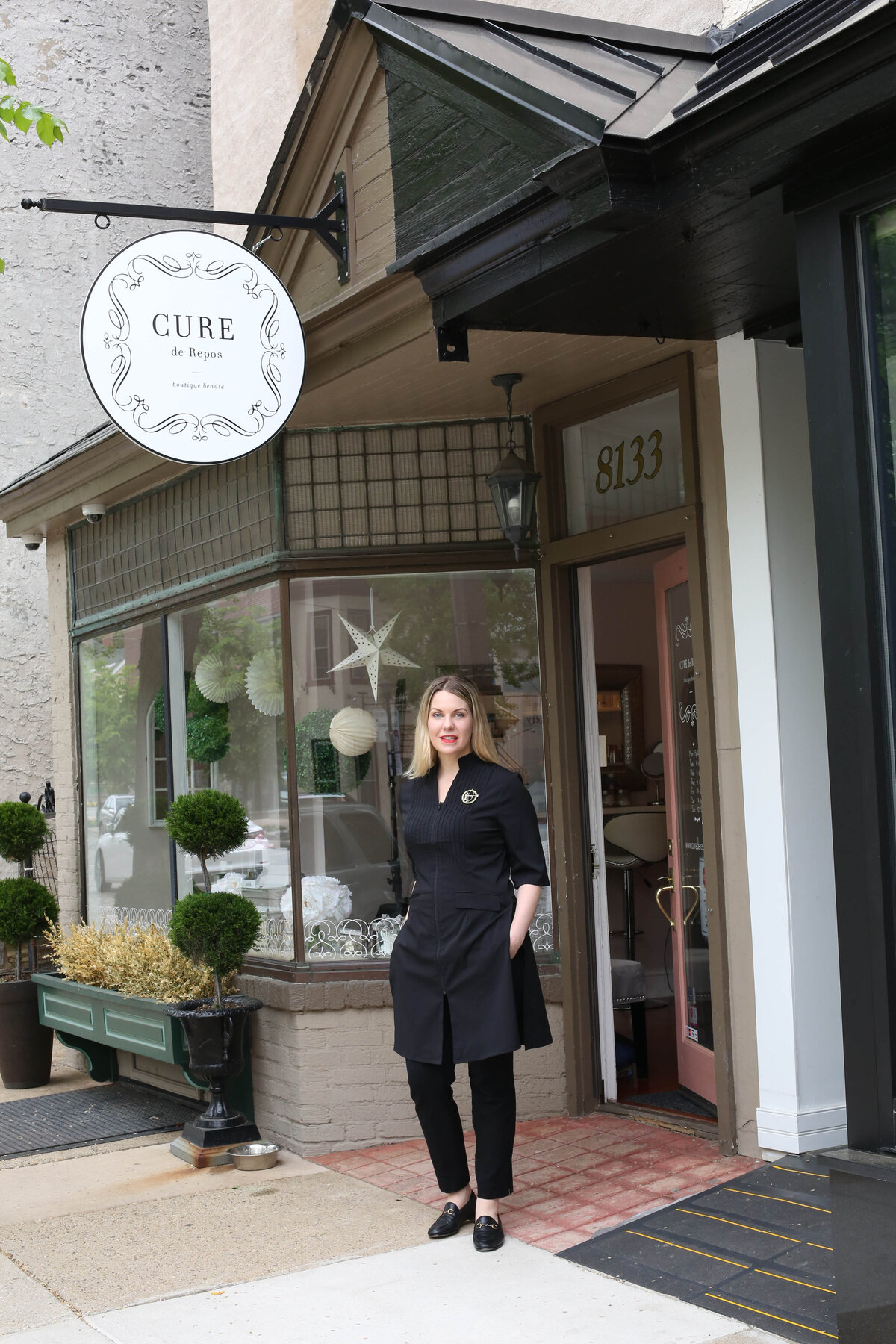 Business Owner in front of her shop