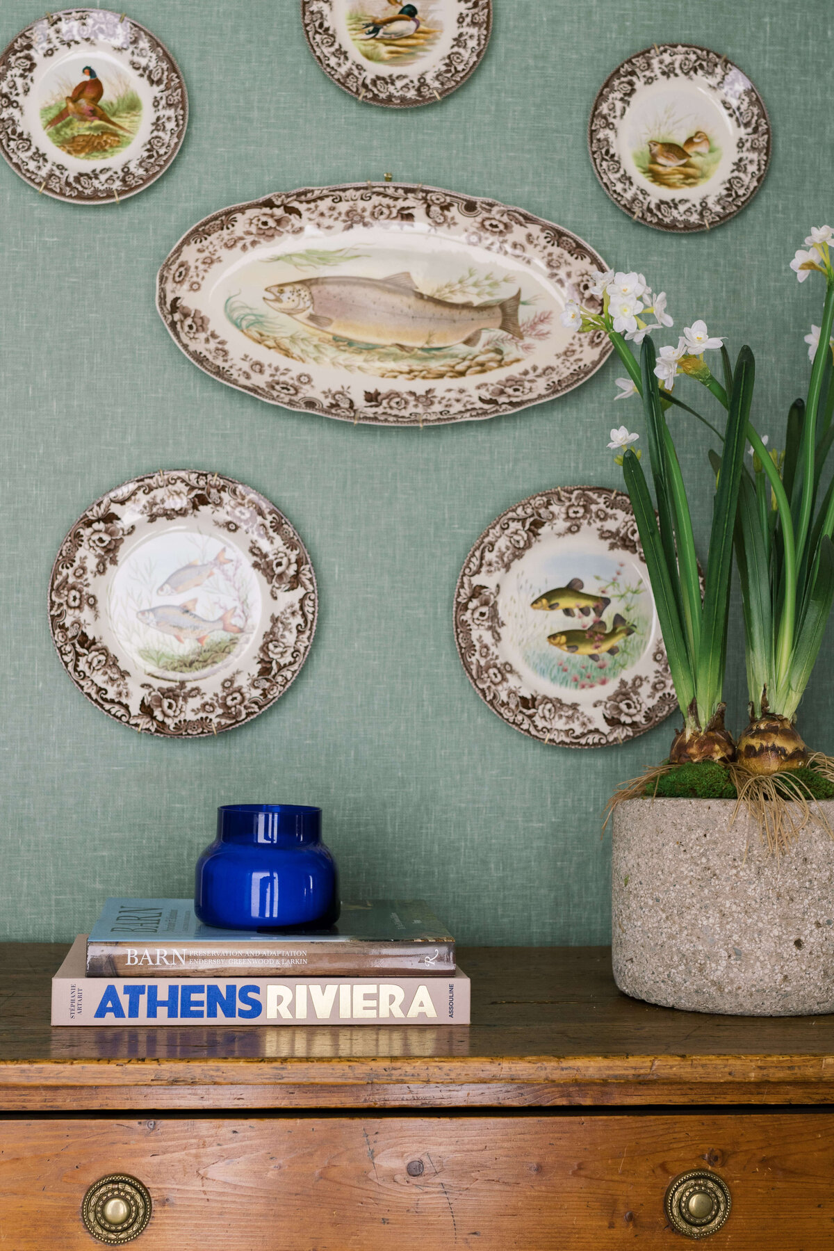 oyster creek studios happy valley fish plaques on a wooden side table