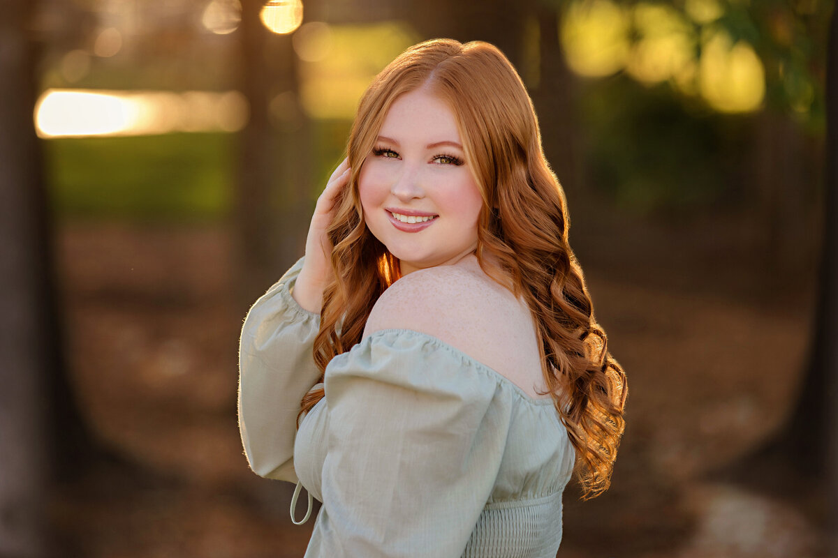 Dreamy high school senior portraits during Autumn with beautiful backlight