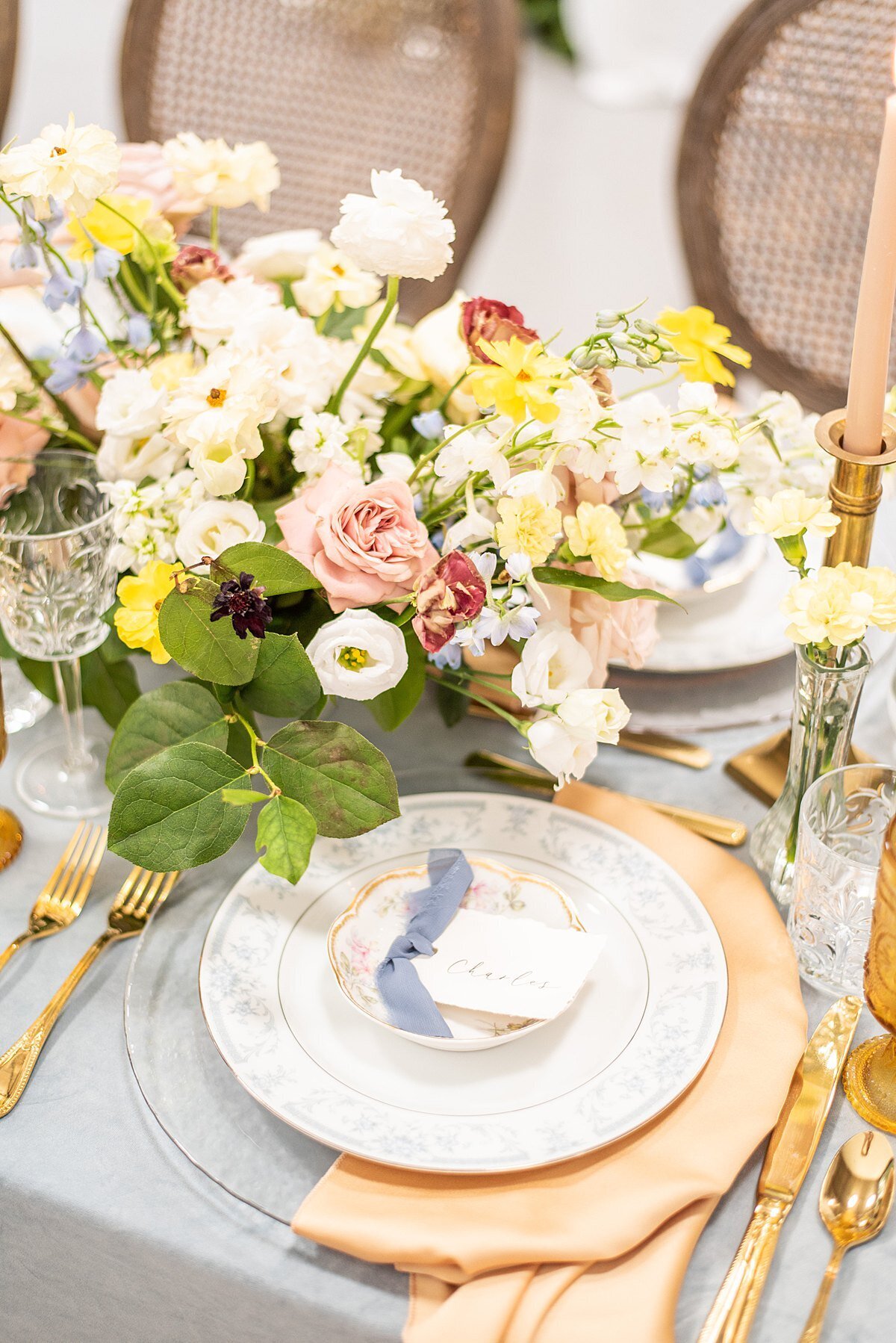 wedding-reception-tablescape-yellow-blue-pink-fairytale-plate