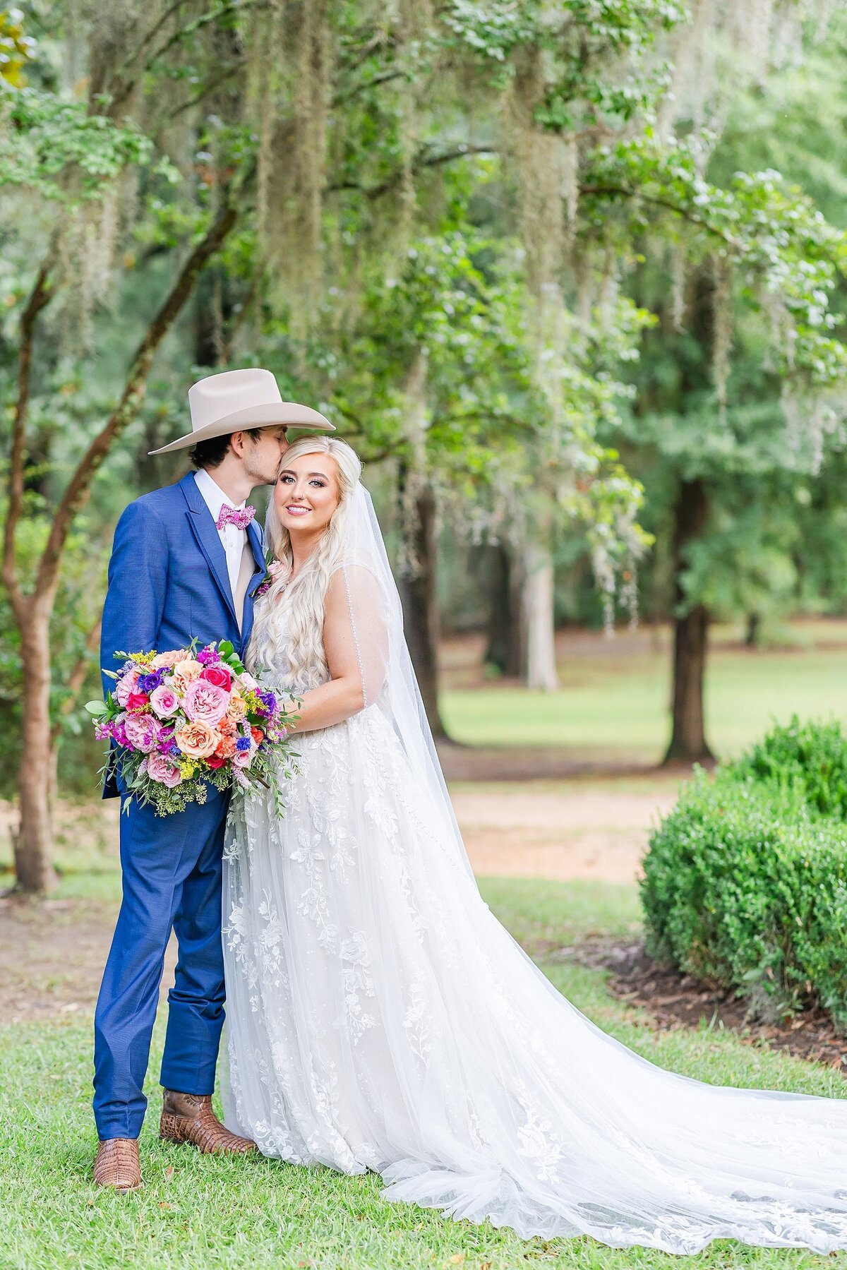 Bride and groom under Spanish moss  | Elms of Coosada Wedding Photographer 
