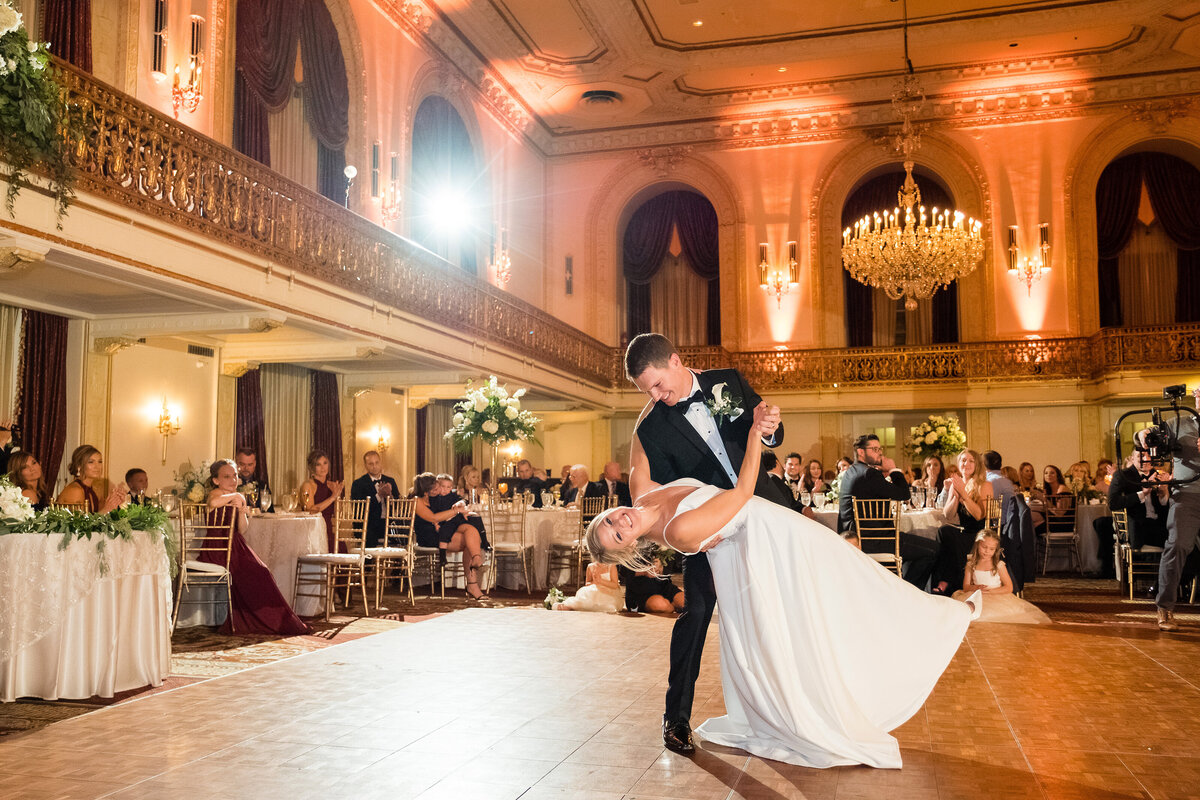 wedding couple dancing together at omni william penn grand ballroom