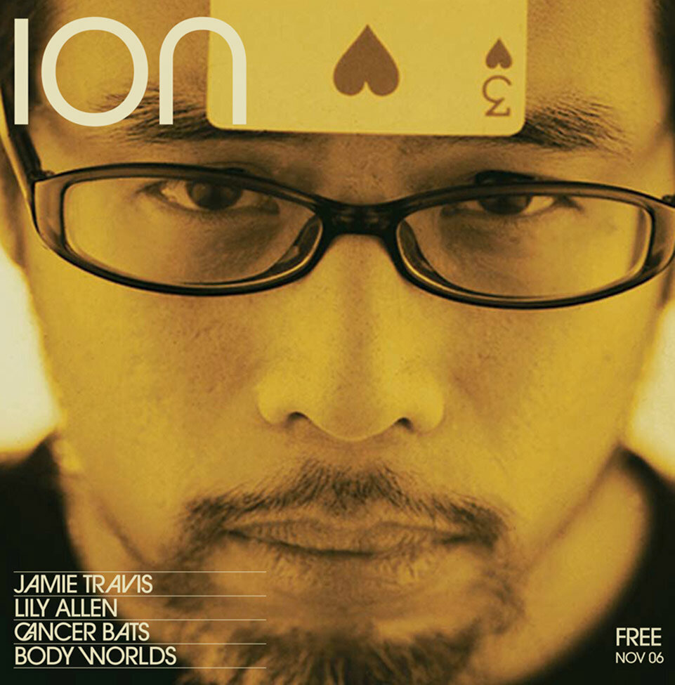 Magazine Cover publication Ion featuring band No Luck Club lead singer in closeup with 3 of hearts playing card stuck to his forehead