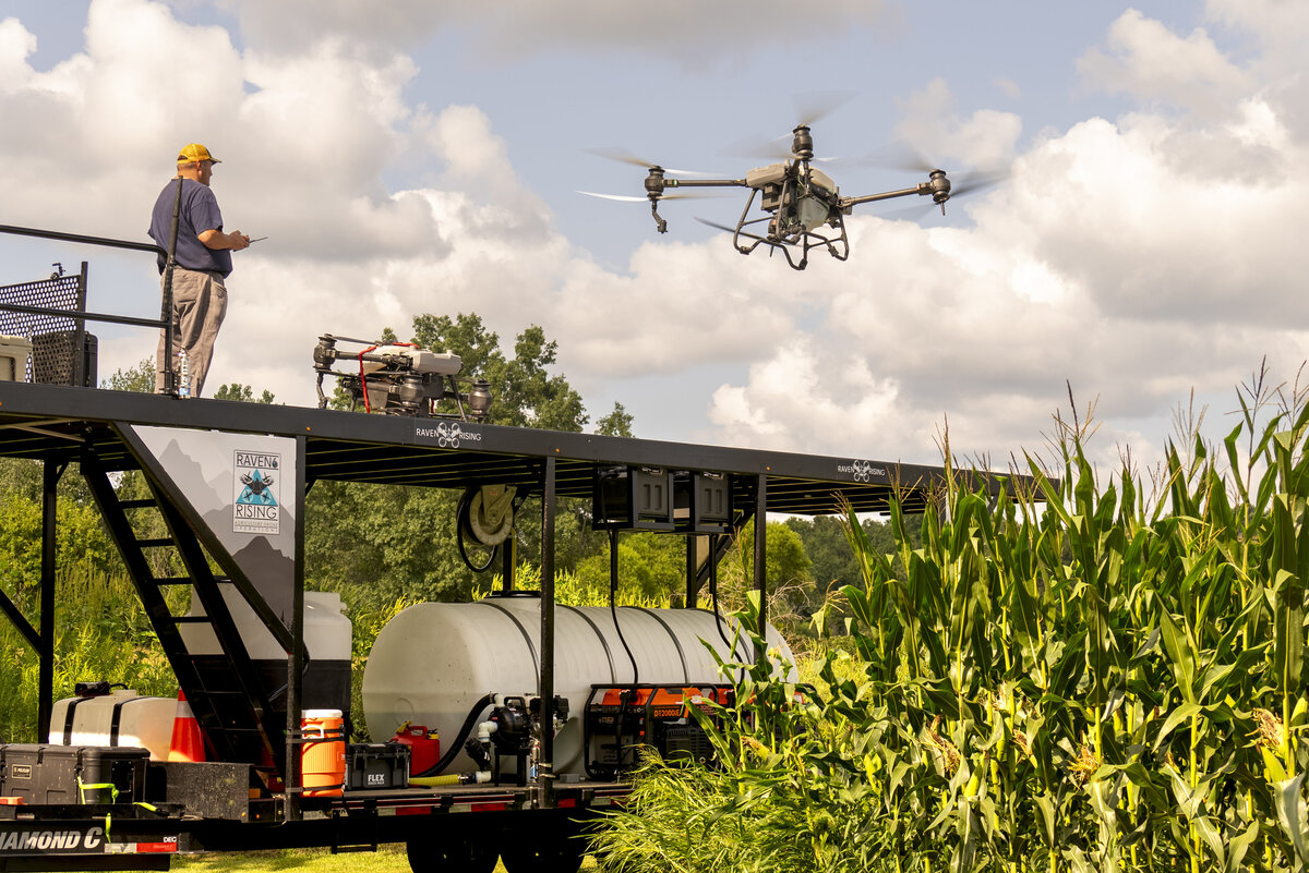 Raven 6 Rising landing the DJI Agras T-40 on the top deck of the NU Way Ag drone trailer