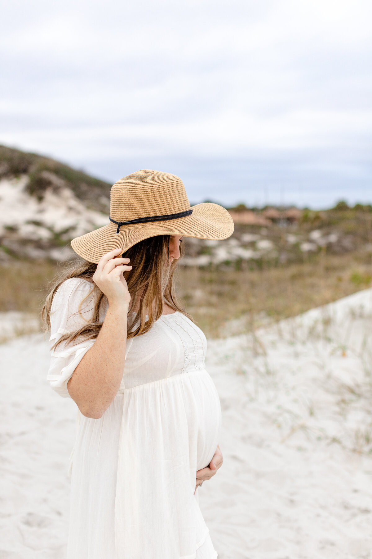 Mommy to be in white dress in Jacksonville, FL