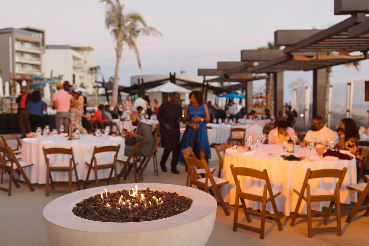 Beachside bonfire welcome dinner to start of a wedding weekend at Cabo San Lucas Hard Rock