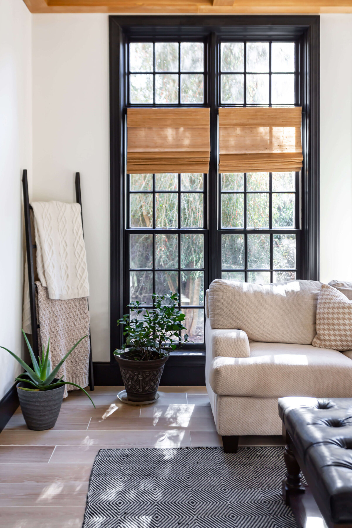 sweet southern home brighton place sofa and window in living room