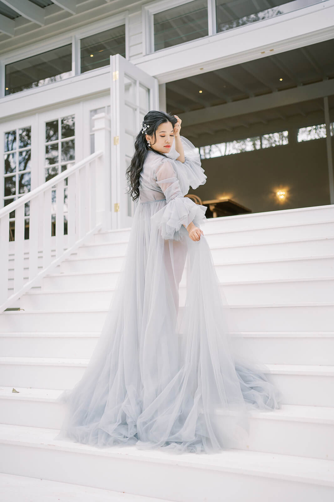 Embrace the elegance of maternity as a mum shines in a stunning blue tulle gown at Gold Coast's Kwila Lodge.