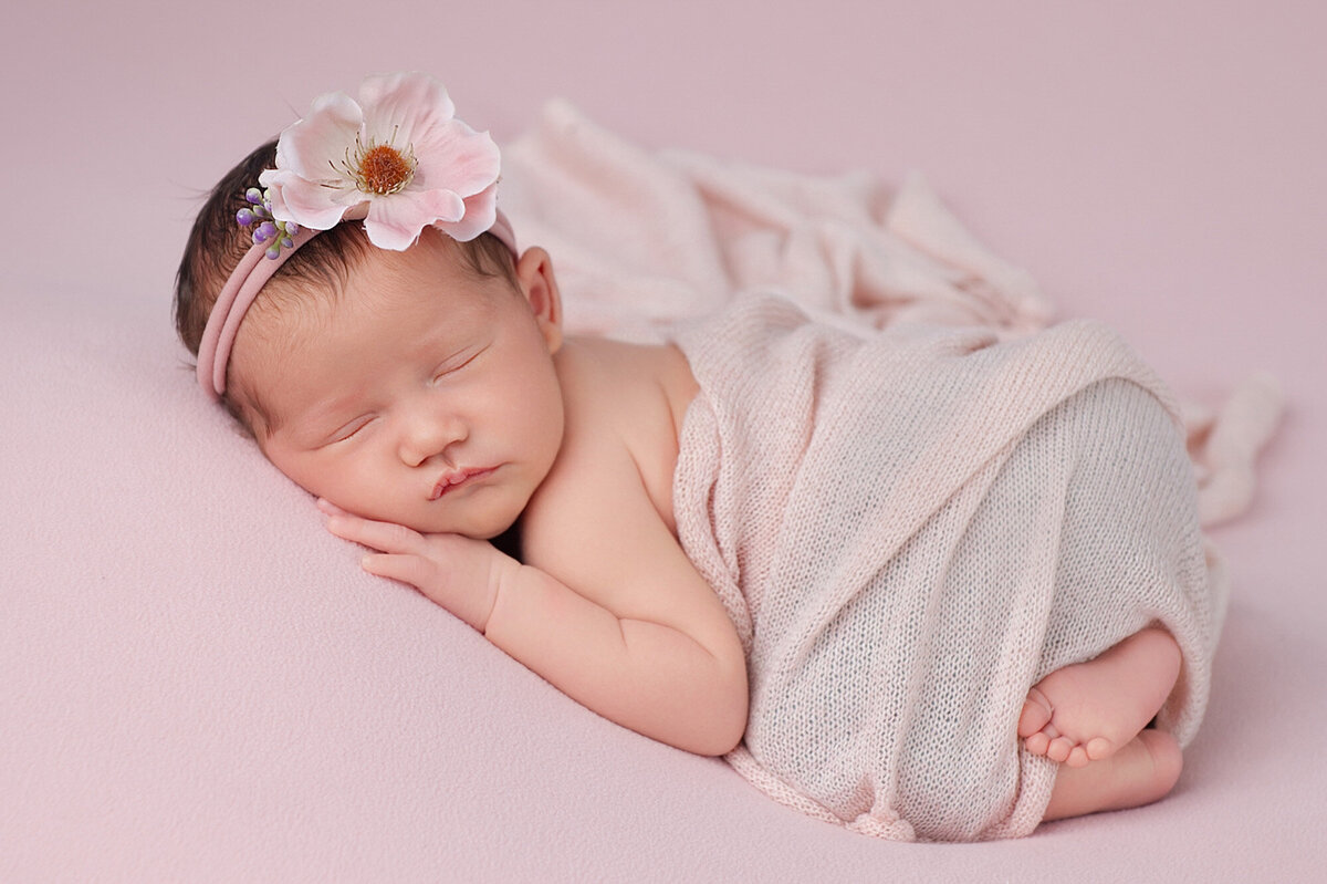 BABY ON PINK FABRIC NEWBORN PHOTSHOOT