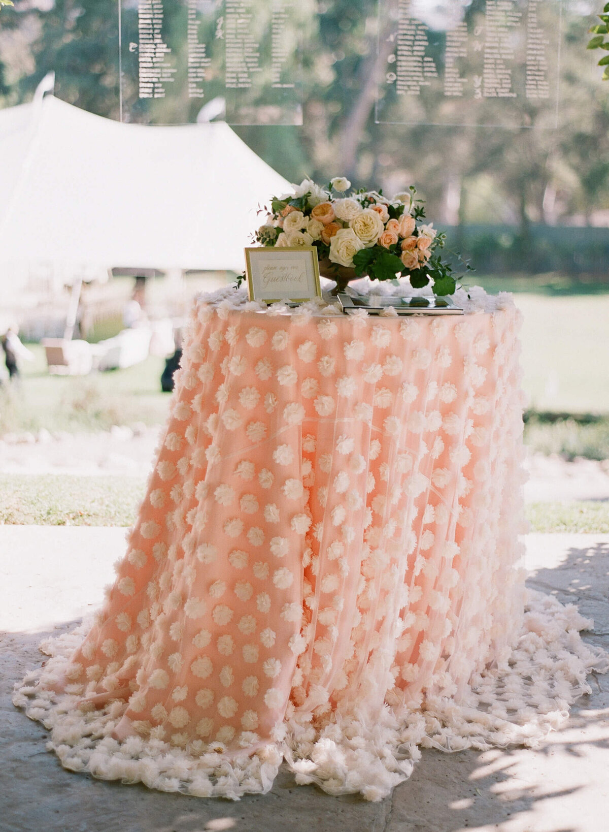 Peach color accents at an outdoor wedding in California