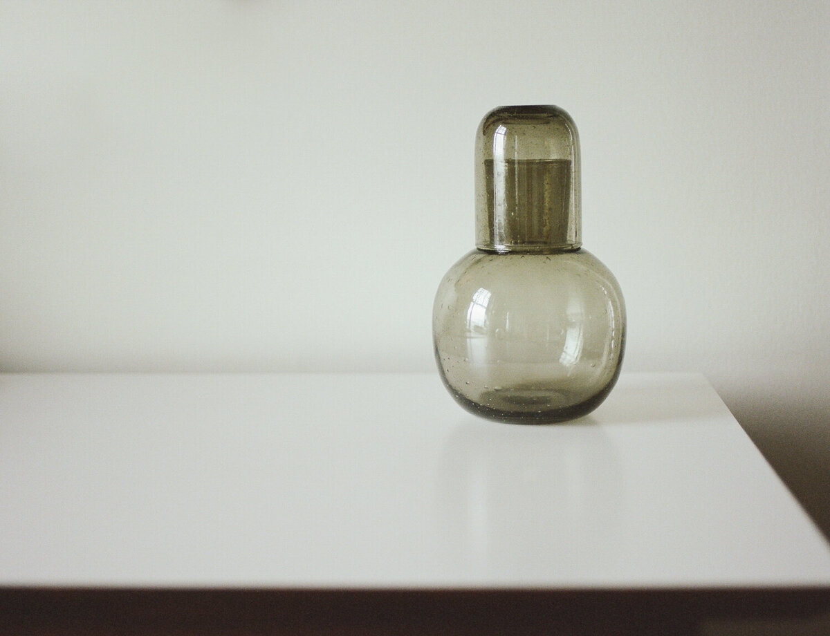 clear green glass handblown carafe at ALEO Detroit, bed and breakfast, branding photos