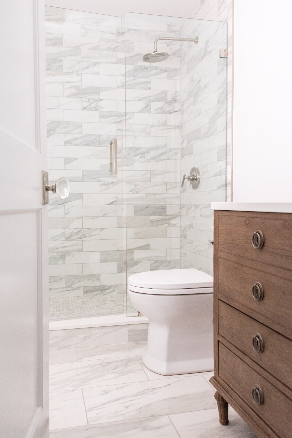 marble-tile-bathroom-glass-shower-wood-vanity-comm-ave-min