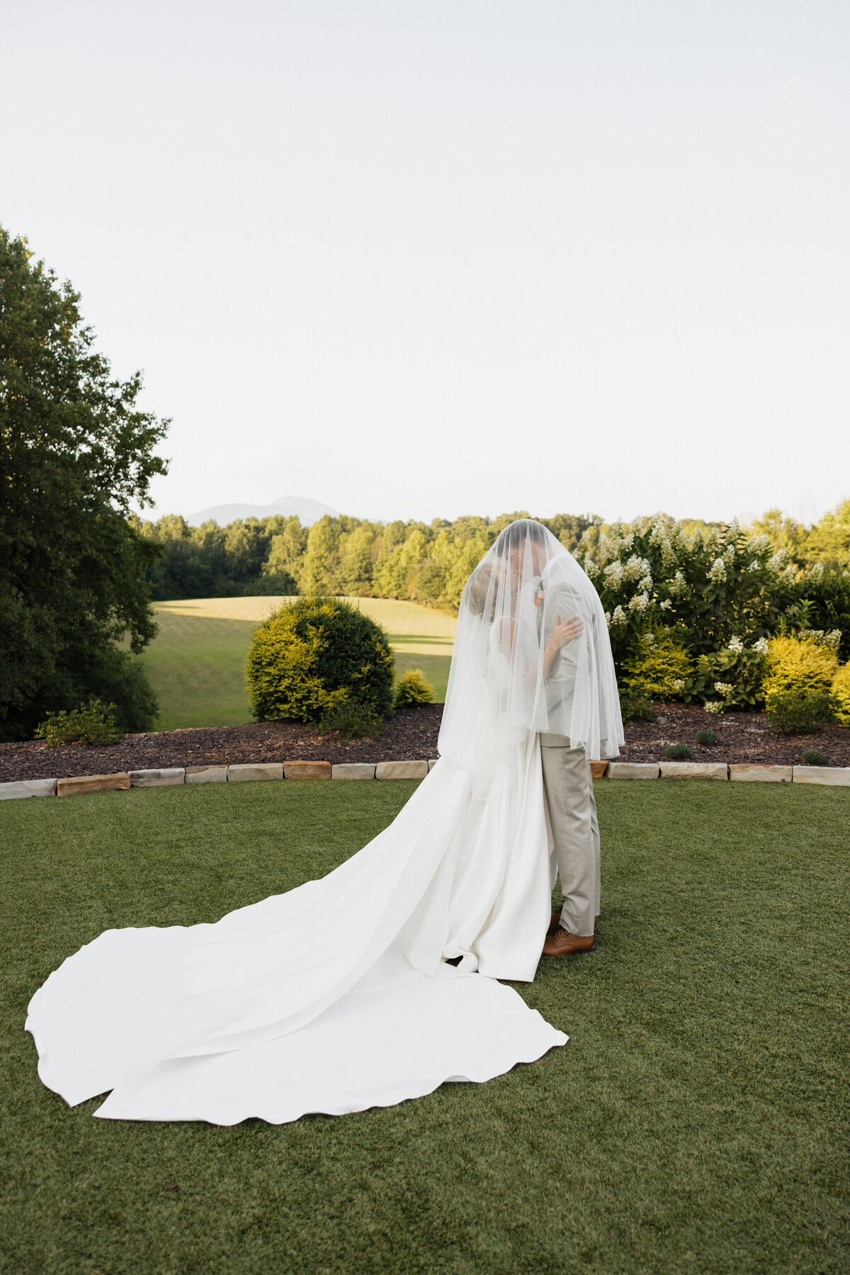 Dreamy wedding veil shot captured at Meadows at Mossy creek in Cleveland, Georgia.