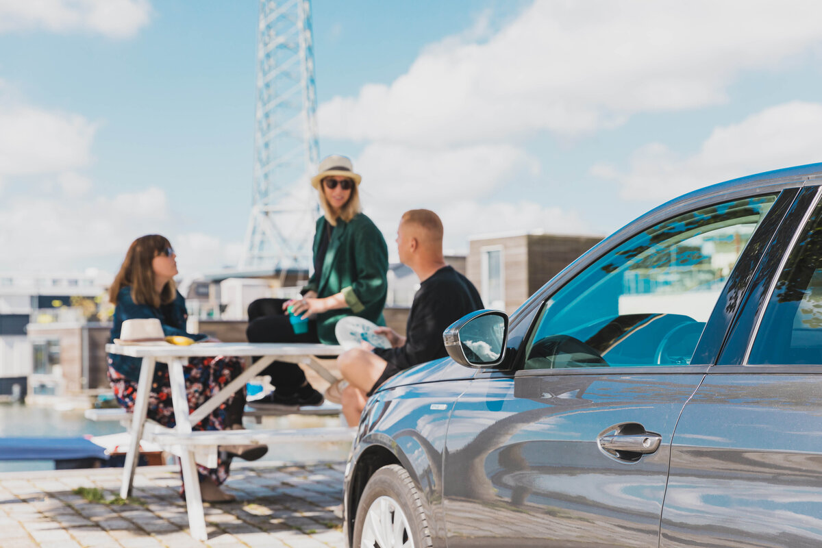Entrepreneurs in an informal outdoor meeting, symbolizing strategic business discussions.