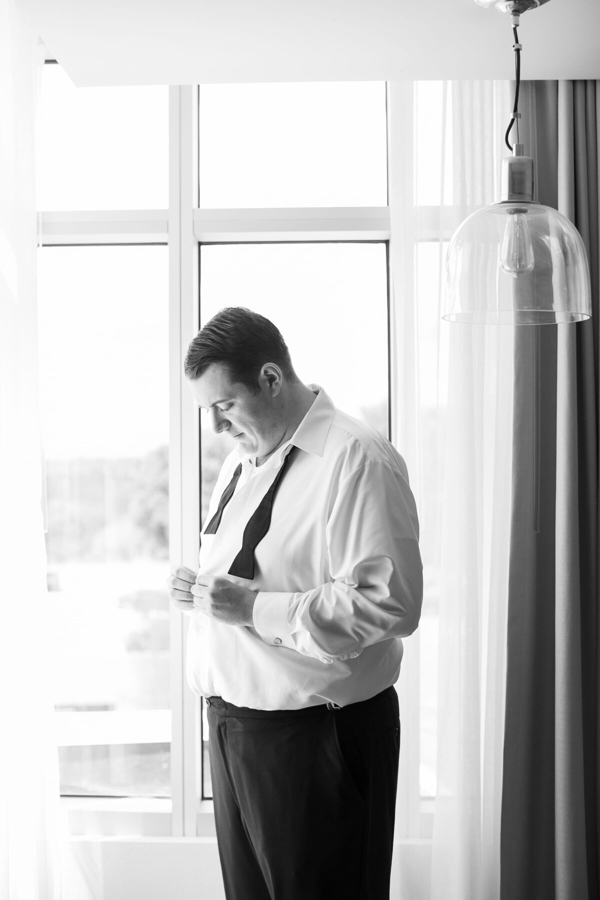 groom-getting-ready-asheville-hotel-wedding