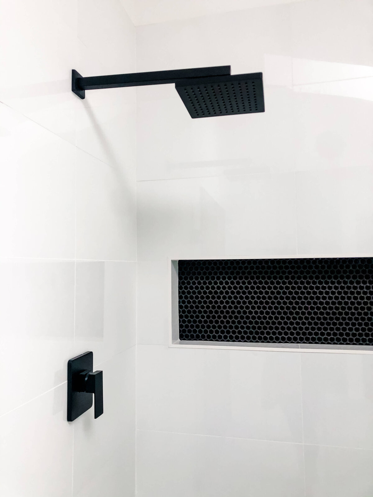 black-penny-tile-shower-niche