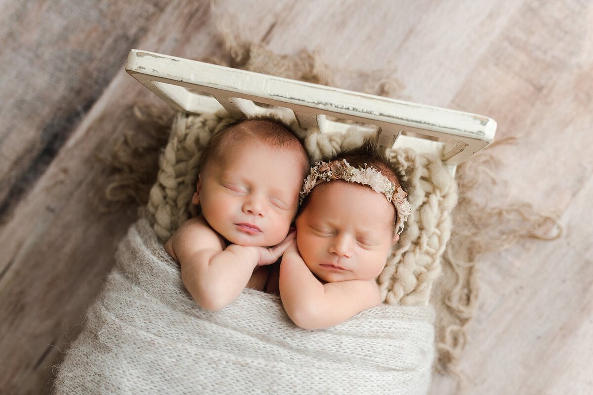 Newborn Twins in a Photography Studio in Springville Alabama in a bed